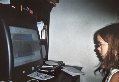 Kate at a computer